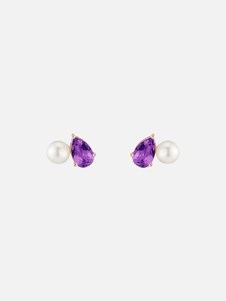Pair of pearl and purple gemstone earrings on a white background.