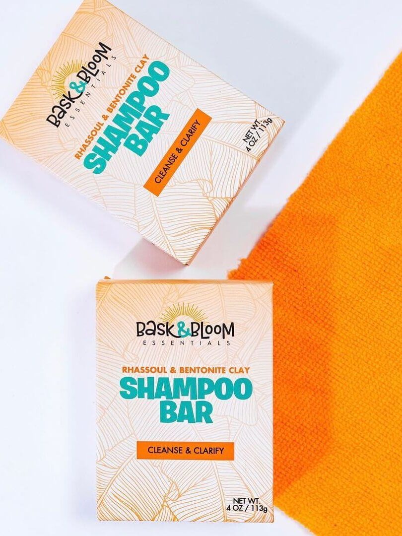 Two Bask & Bloom shampoo bar packs. 
