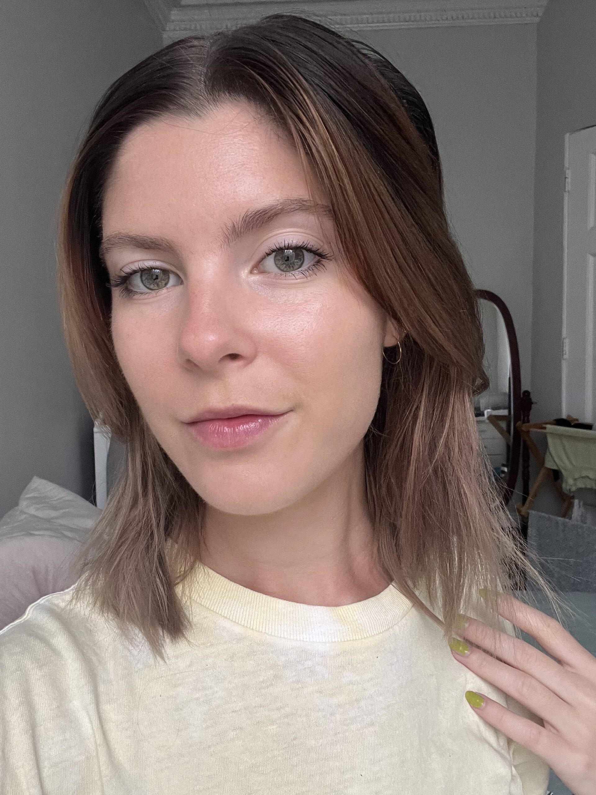 A woman wearing Juice Beauty foundation.