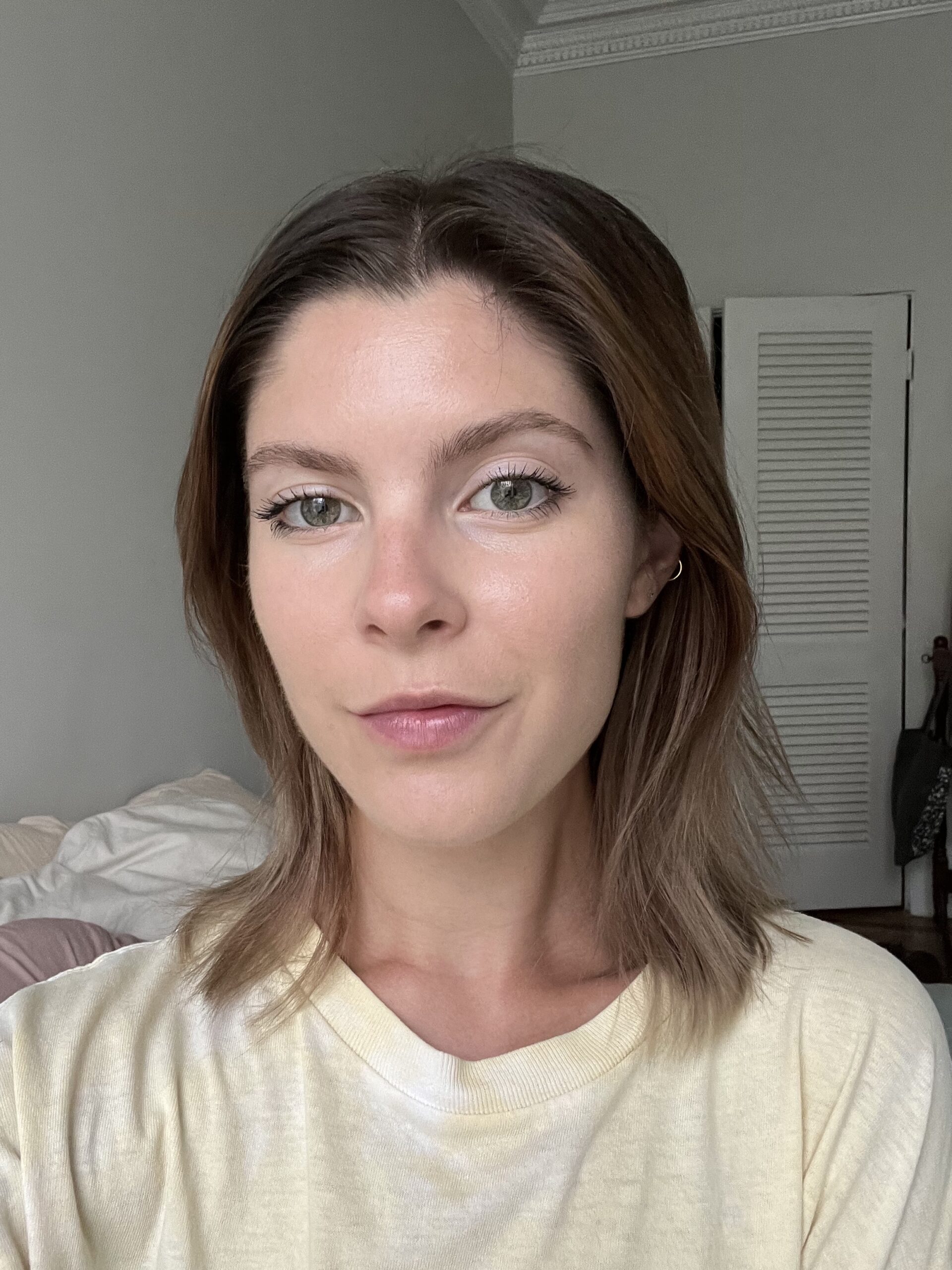 A woman wearing Merit foundation.