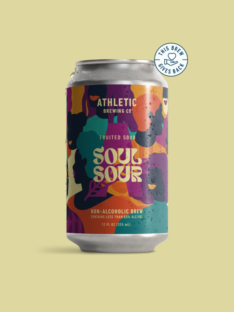 Can of Athletic Brewing Co. Soul Sour Fruited Sour, non-alcoholic brew, 12 fl oz, with colorful abstract label design and "This Brew Gives Back" badge.