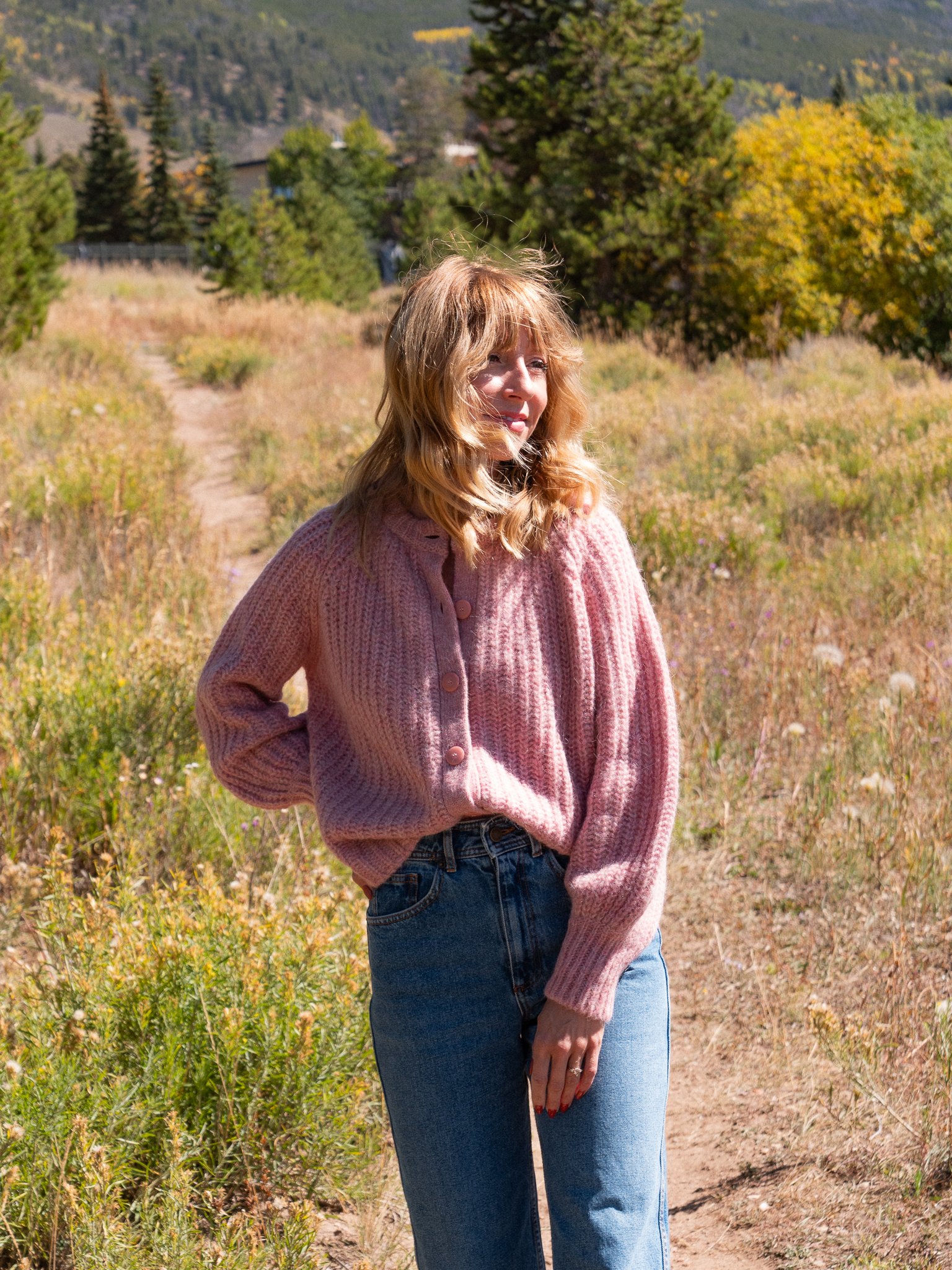 The writer wearing the Sézane Emile Cardigan. 