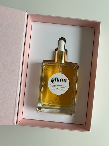 The hair oil in its box.