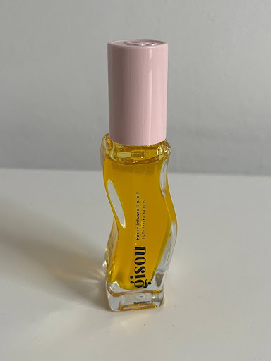 The Gisou lip oil has an intriguing curvy shape.