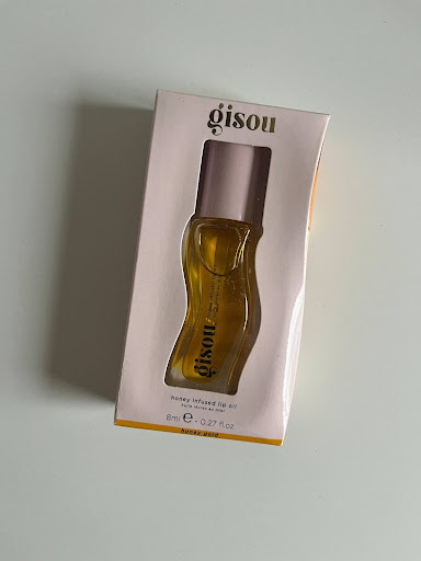 The Gisou lip oil in its package.