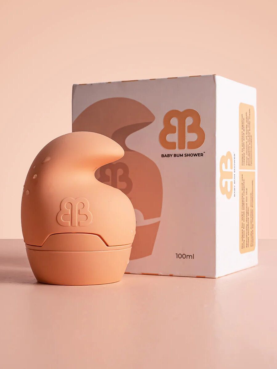 Baby Bum Shower product in front of its packaging.