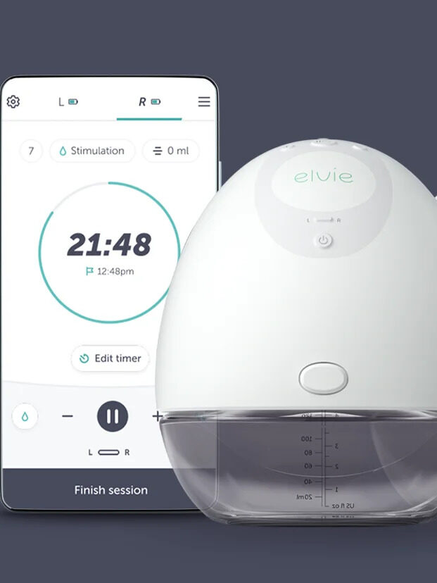 The Elvie Breast Pump next to the phone app. 