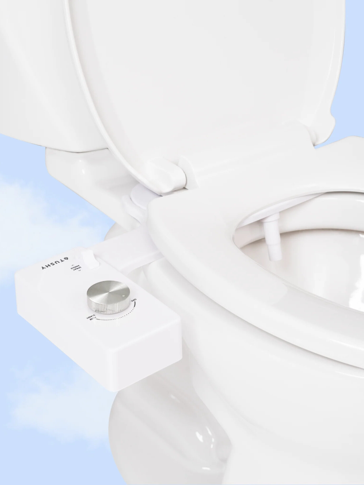 TUSHY bidet on a toilet.