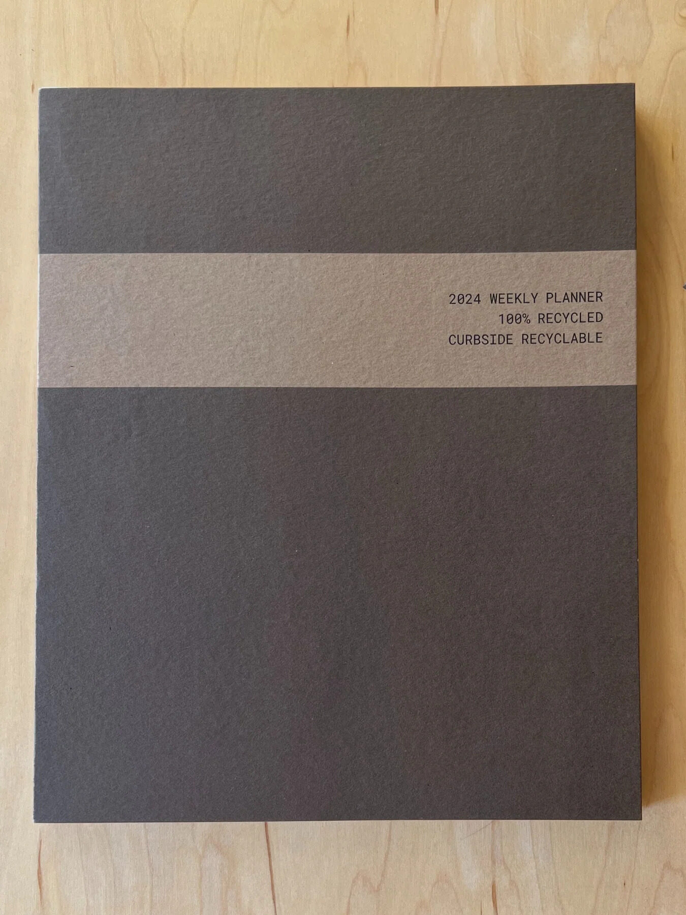 The front of Wisdom Supply Co.'s 2024 weekly planner.