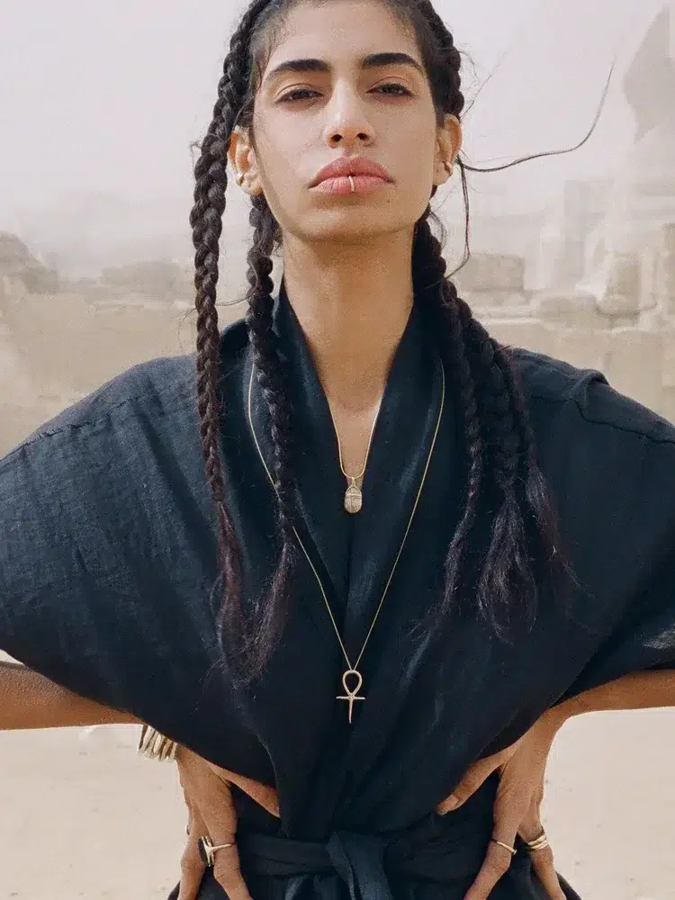 A model wearing Catori Life jewelry.