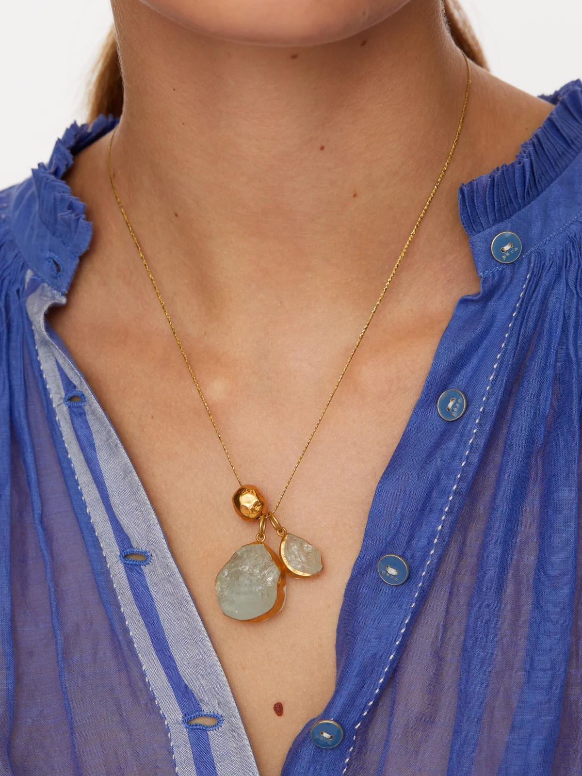 A model wearing a necklace from Pippa Small