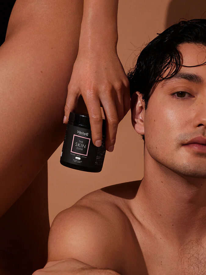 A model holding a jar of Welleco skin elixir by their hip, next to a shot of another model's face by the product. 