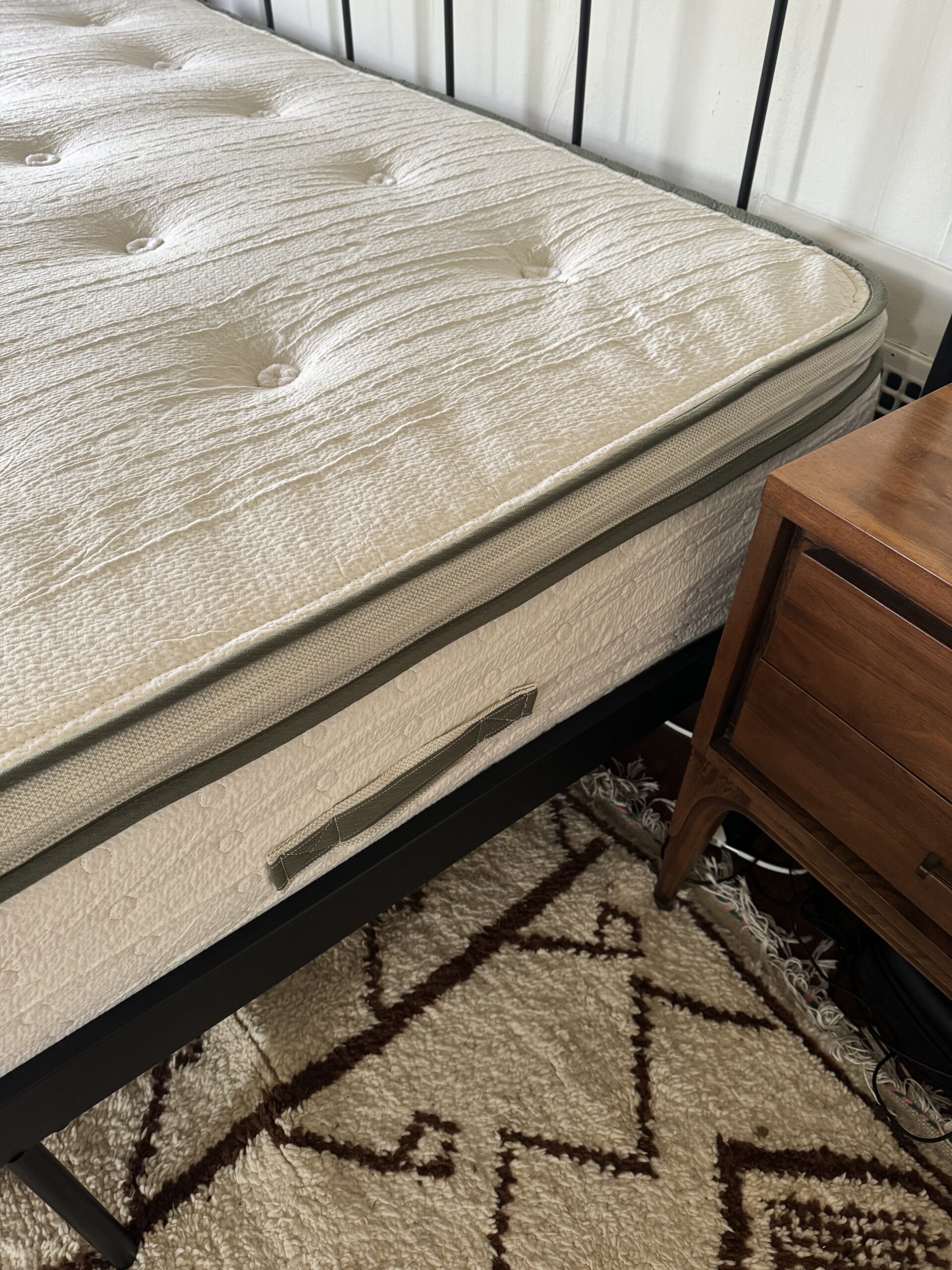 A close up of Avocado's fiberglass free mattress.
