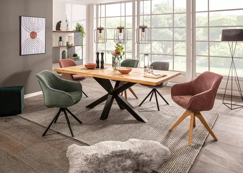 A wooden dining table set in a dining area from Mobello Furniture.