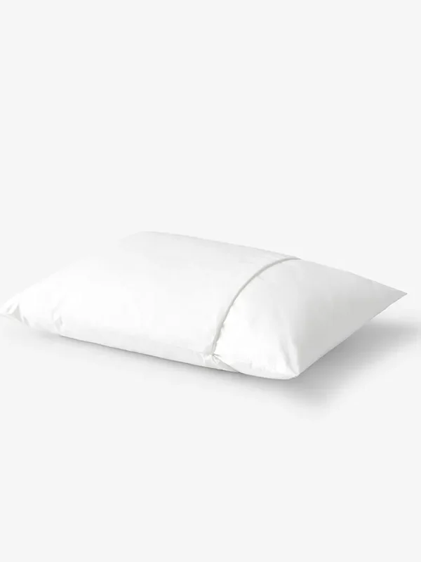 A plain white pillow with a white pillowcase displayed against a white background.