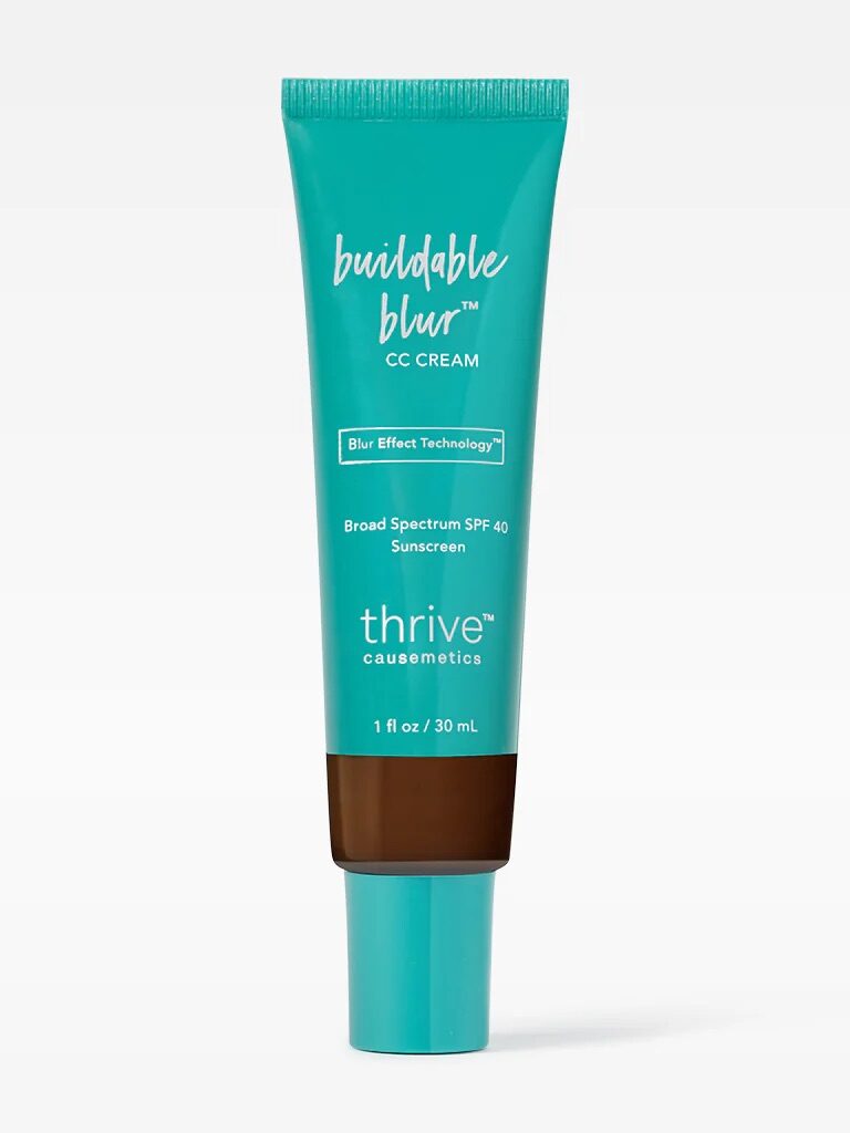 A 1 oz tube of Thrive Causemetics Buildable Blur CC Cream with SPF 40. The tube is teal with white text and a brown cap.