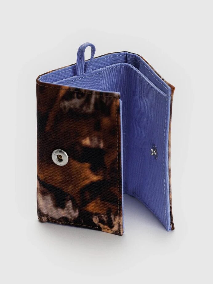A half open BAGGU wallet in camo.