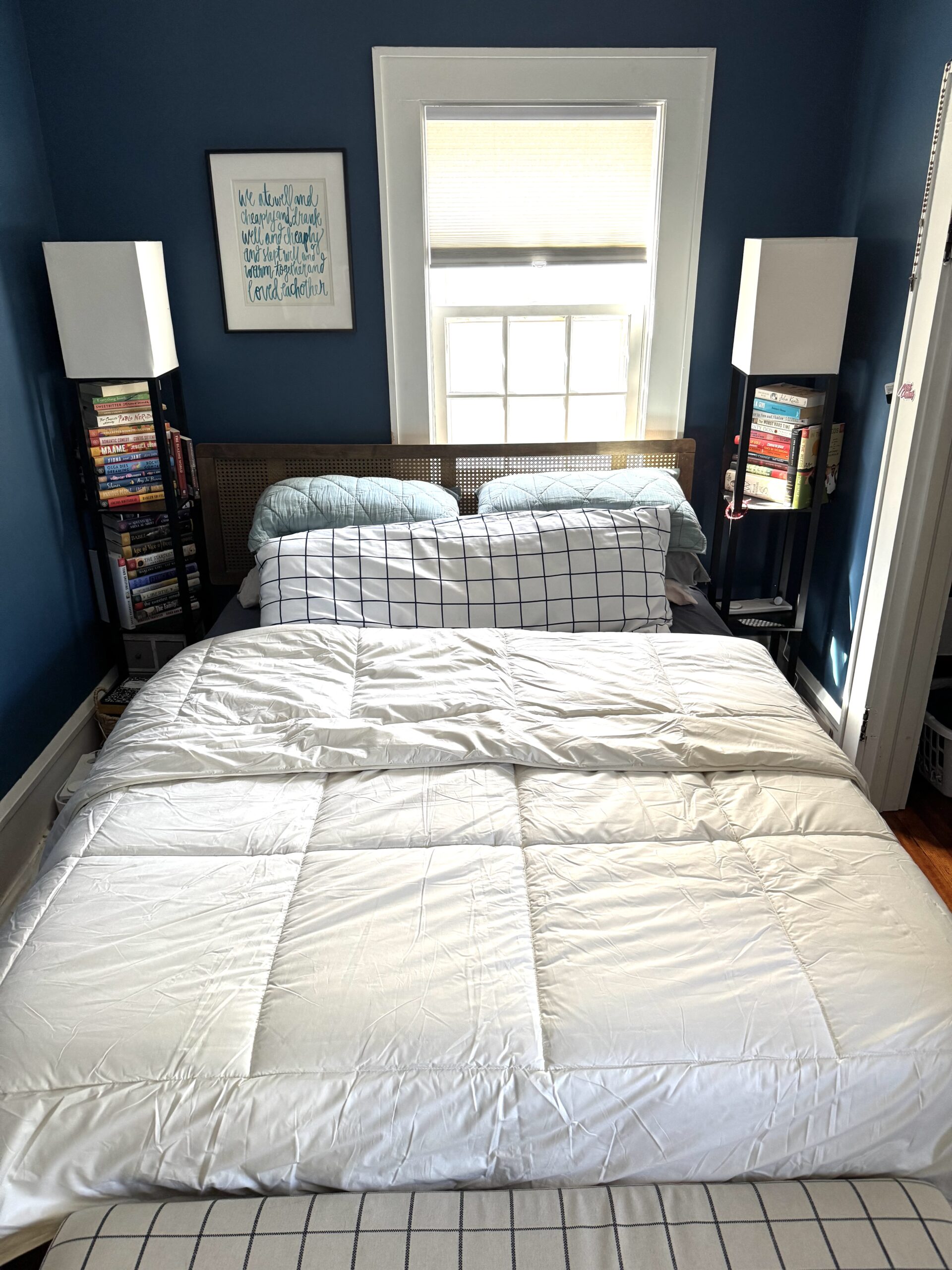 A Naturepedic duvet insert comforter on a bed.