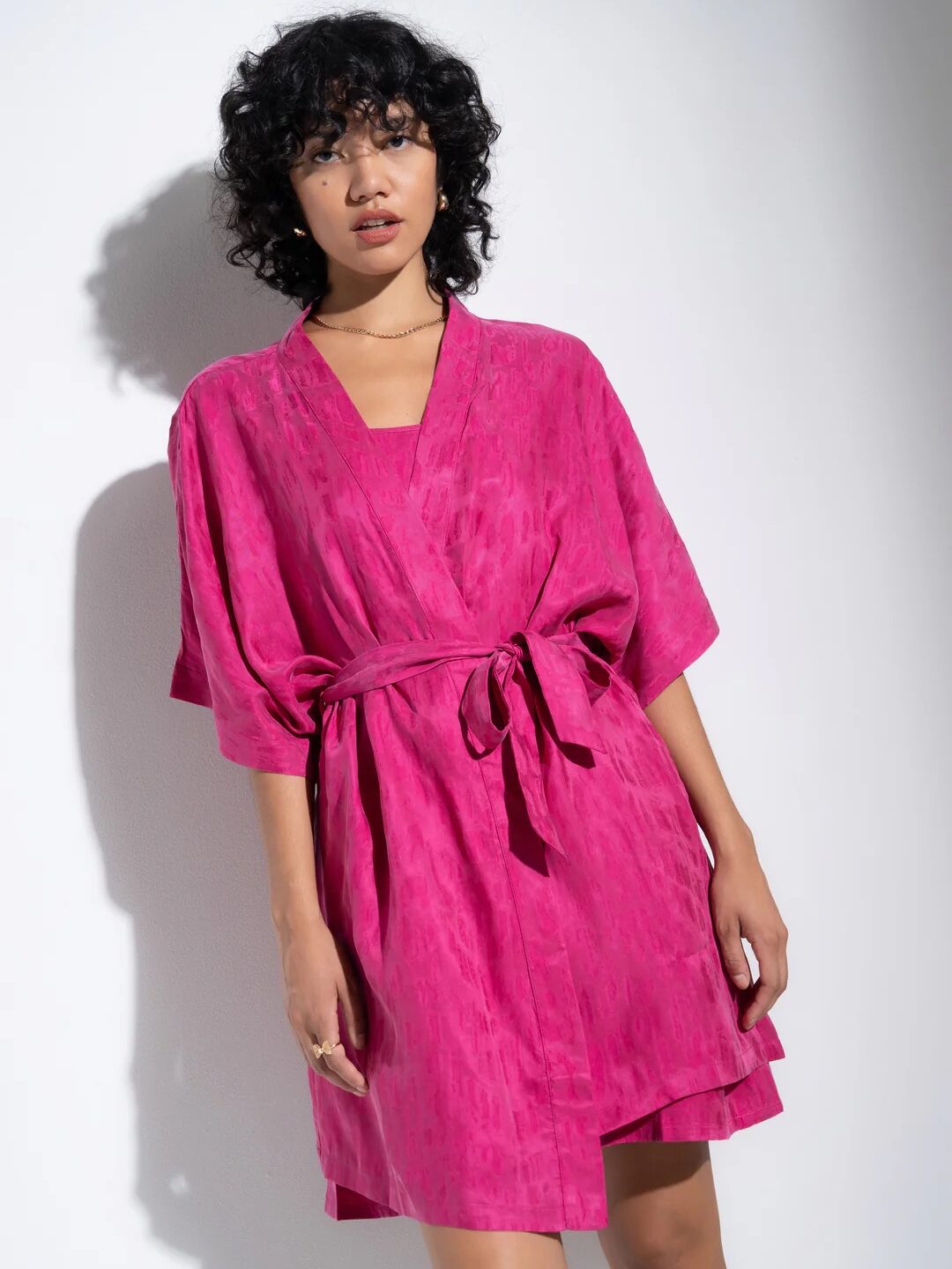 A model wearing an Idle robe.