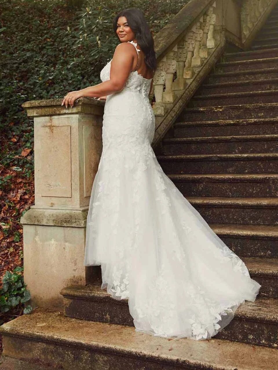 A model wearing a wedding dress from Once Wed.