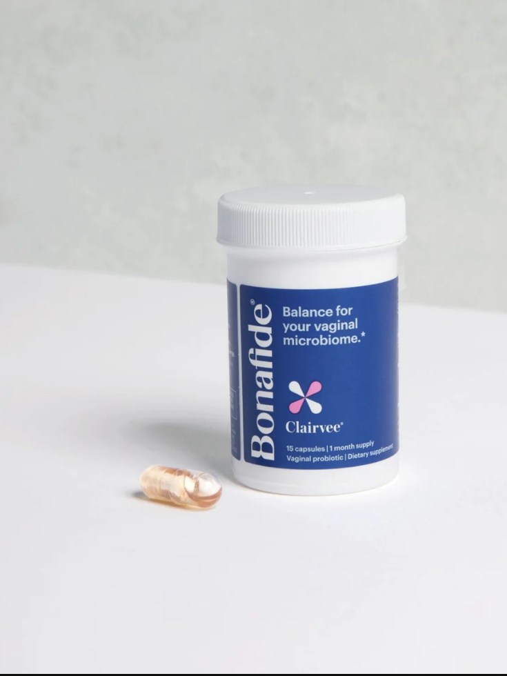 A bottle labeled "Bonafide Clairvee" with the text "Balance for your vaginal microbiome" next to a single transparent capsule on a white surface.