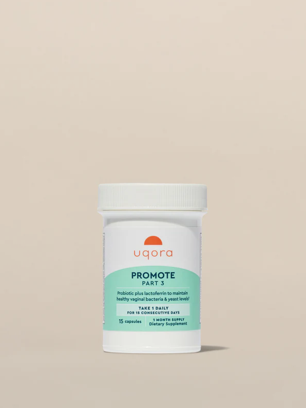A white bottle labeled "Uqora Promote Part 3" with 15 capsules daily supplement on a beige background.
