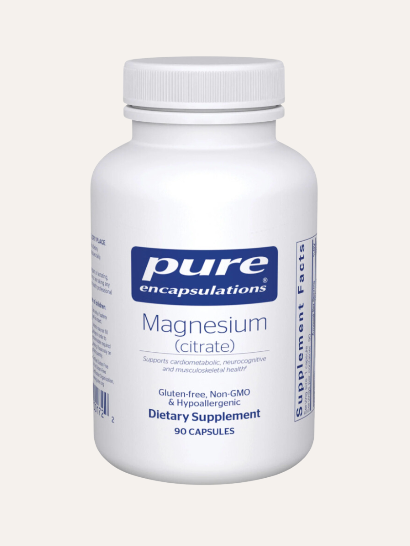 A white bottle of Pure Encapsulations Magnesium (citrate) dietary supplement, containing 90 capsules.
