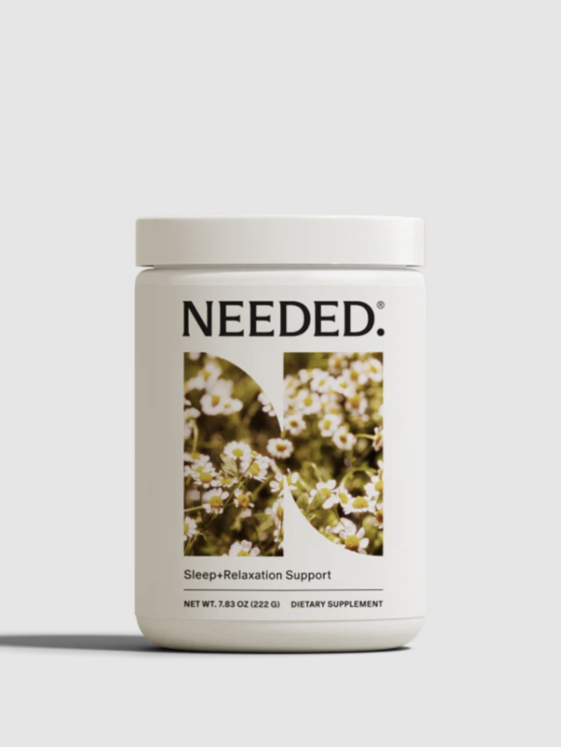 A white container labeled "NEEDED. Sleep+Relaxation Support" with floral imagery, containing dietary supplements. Net weight: 7.83 oz (222 g).