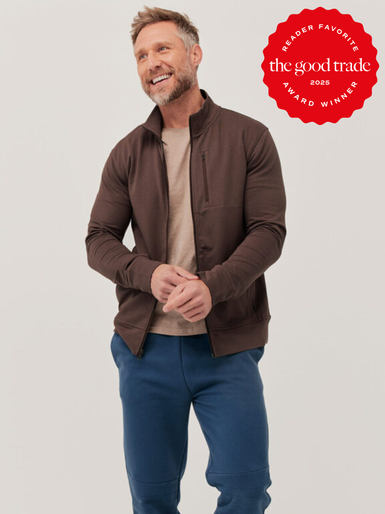 Man in brown jacket and blue pants standing, smiling. Red award badge on upper right corner reads "Reader Favorite, the good trade, 2025 Award Winner.