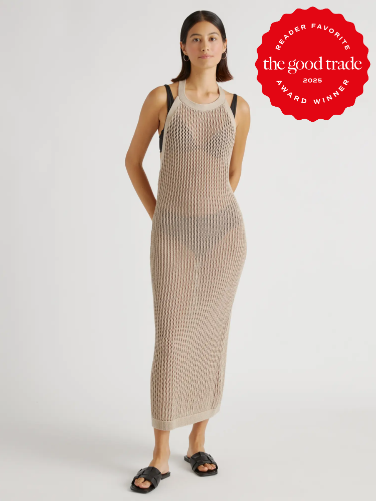 Woman in a long, sleeveless, knitted dress poses. She wears sandals. A red badge reads "Reader Favorite, The Good Trade, 2025 Award Winner.