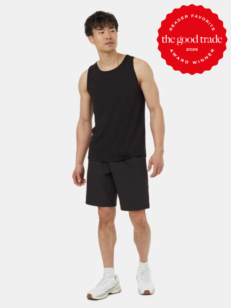 Person wearing a black tank top and shorts stands against a white background. A red "Reader Favorite: The Good Trade 2025 Award Winner" badge is displayed in the top right corner.