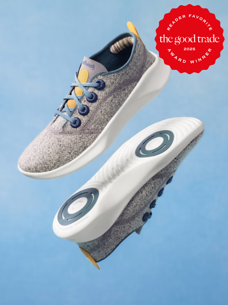 Pair of gray sneakers with blue and yellow accents, featuring white soles. A red seal on the image reads, "Reader Favorite, the good trade, Award Winner 2025.