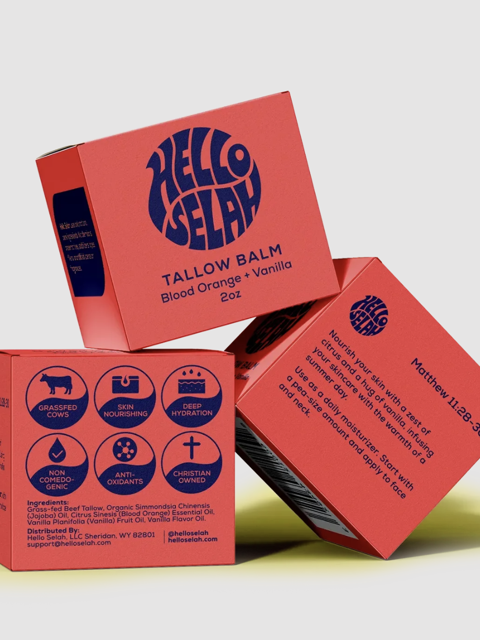 Three stacked red boxes of Hello Selah Tallow Balm, featuring Blood Orange and Vanilla, displaying various features and ingredients list.