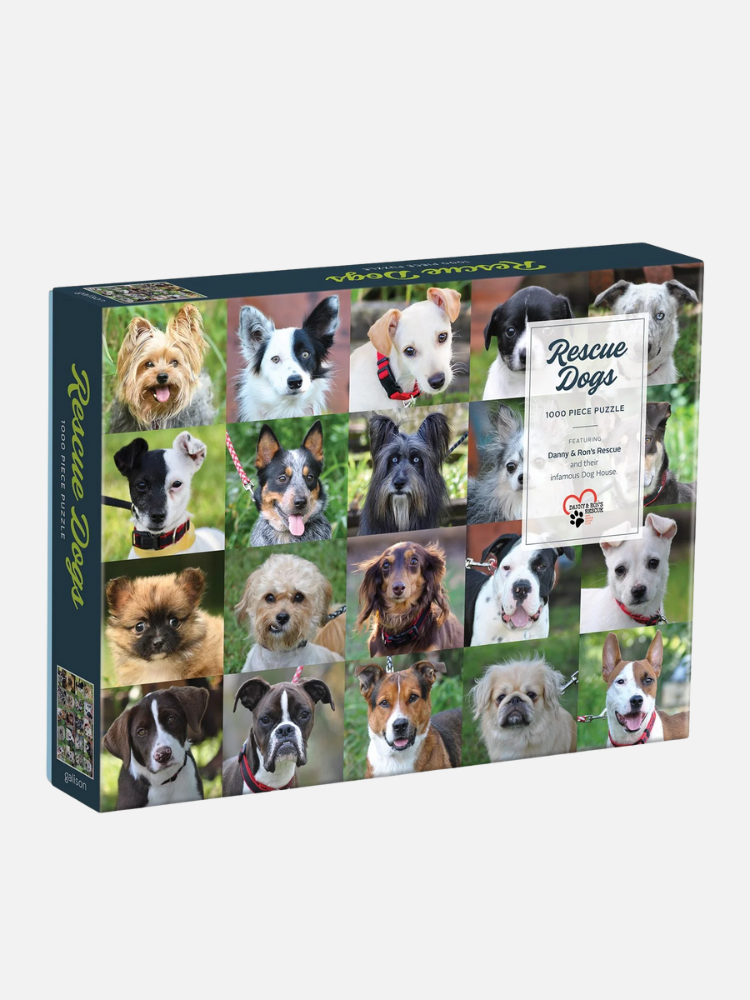 A 1000-piece puzzle box featuring a collage of photos of various rescue dogs, each shown against a green outdoor background.