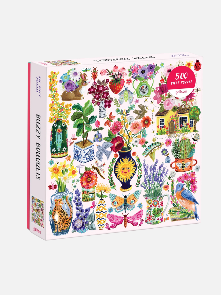 A 500-piece puzzle box featuring colorful illustrations of various flowers, plants, and vases, with the title "Buzzy Bouquets" on the side.