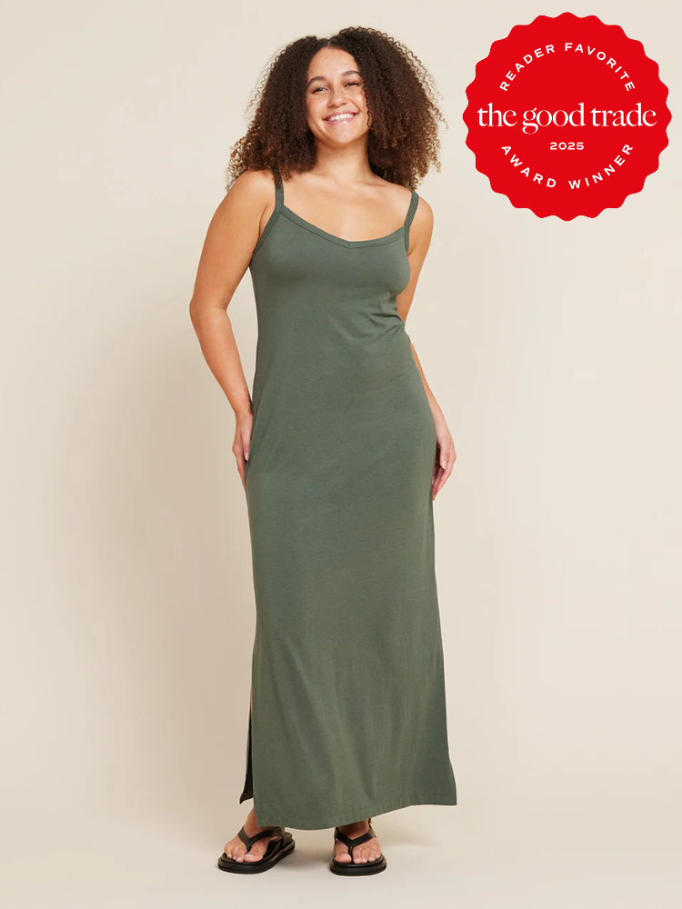 Person in a green sleeveless maxi dress and flip-flops smiles. A red badge reads "Reader Favorite, the good trade, 2025 Award Winner.