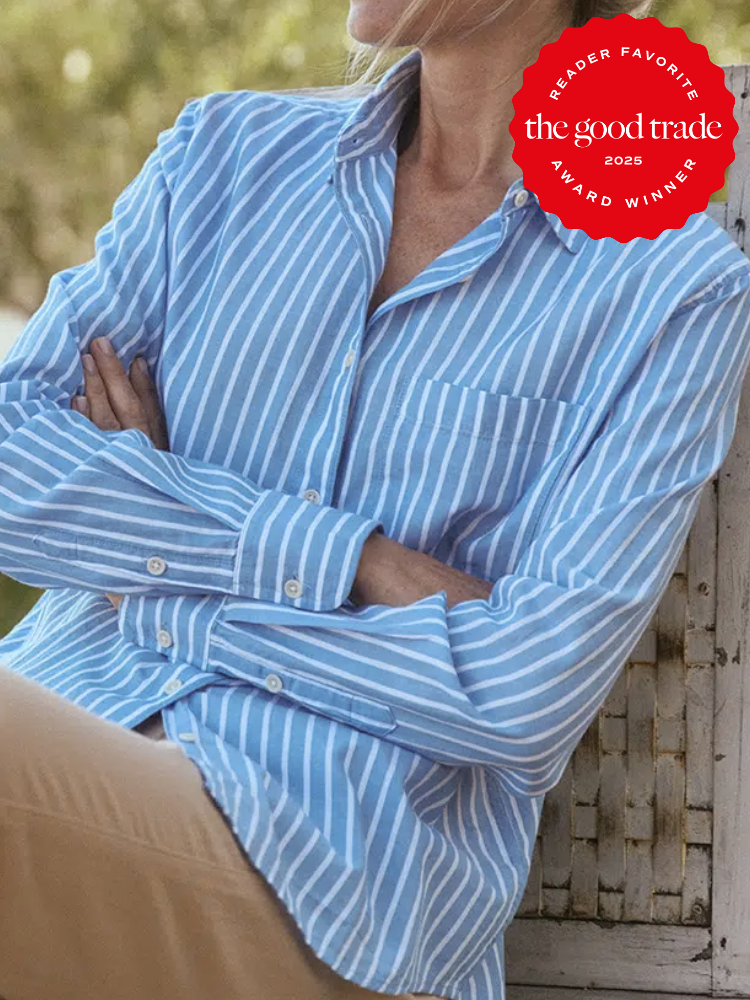 Person wearing a blue and white striped shirt, sitting with arms crossed. "The Good Trade 2025 Reader Favorite Award Winner" badge in the top right corner.