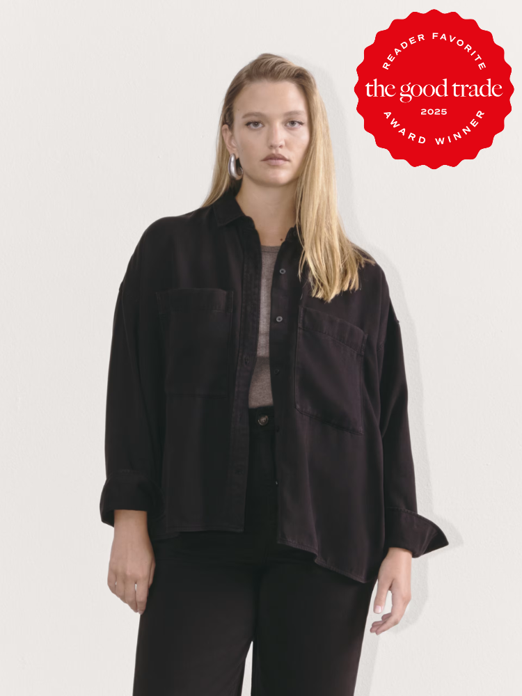 Person wearing a dark shirt and pants poses against a light backdrop. The image features a red badge that reads, "Reader Favorite the good trade 2025 Award Winner.