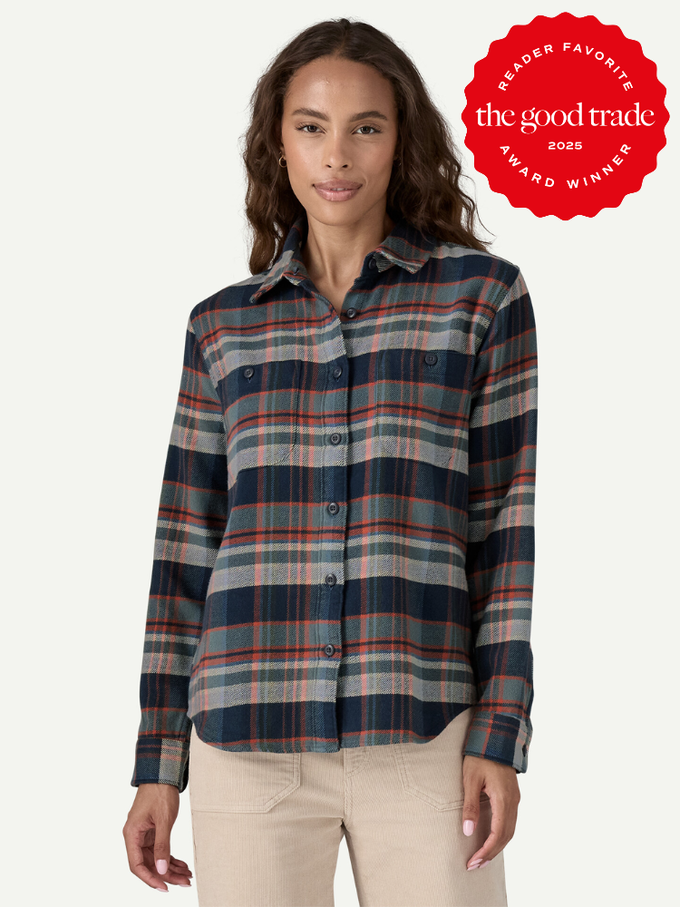 A person wearing a plaid button-up shirt stands against a plain background. A red badge reads "Reader Favorite, The Good Trade, Award Winner 2023.