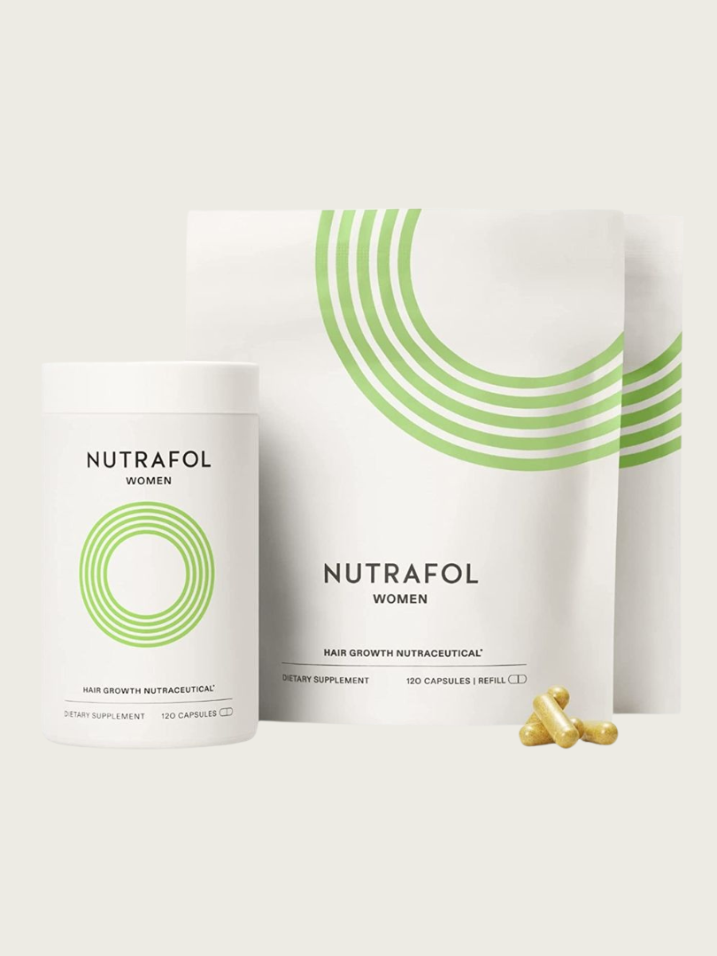 Nutrafol Women hair growth supplement packaging with capsule pills shown. Includes a cylindrical container and refill pouches with a green circular design on a neutral background.
