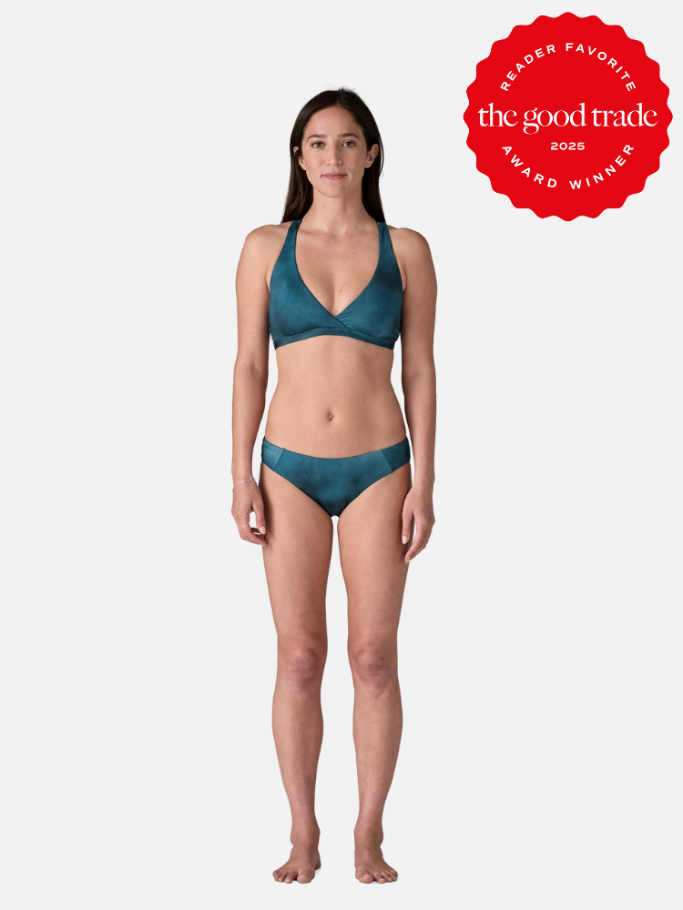 A woman wearing a teal bikini stands against a plain background. A red badge on the image reads "Reader Favorite, The Good Trade, Award Winner 2023.