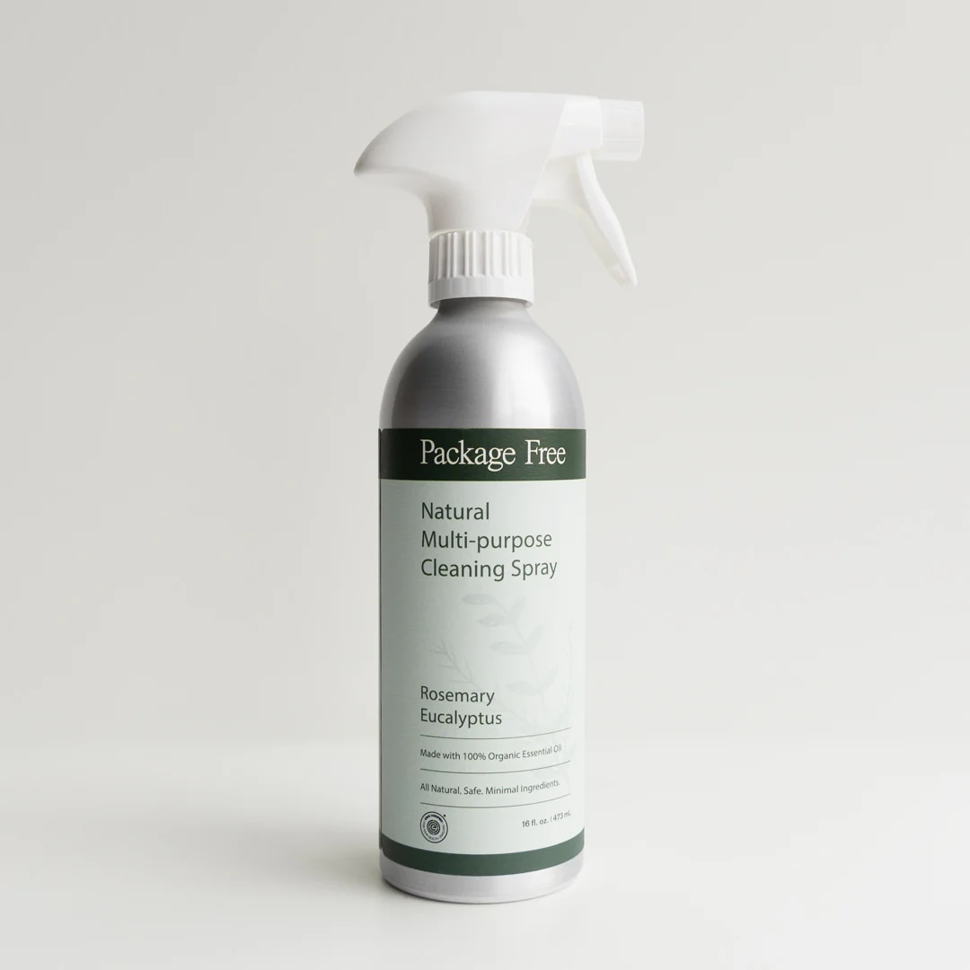 A silver spray bottle labeled "Package Free Natural Multi-purpose Cleaning Spray, Rosemary Eucalyptus" stands against a plain white background.