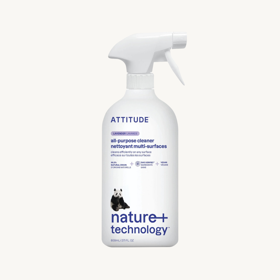 A white spray bottle labeled "Attitude all-purpose cleaner, lavender" with a panda graphic and "nature + technology" text on the front.