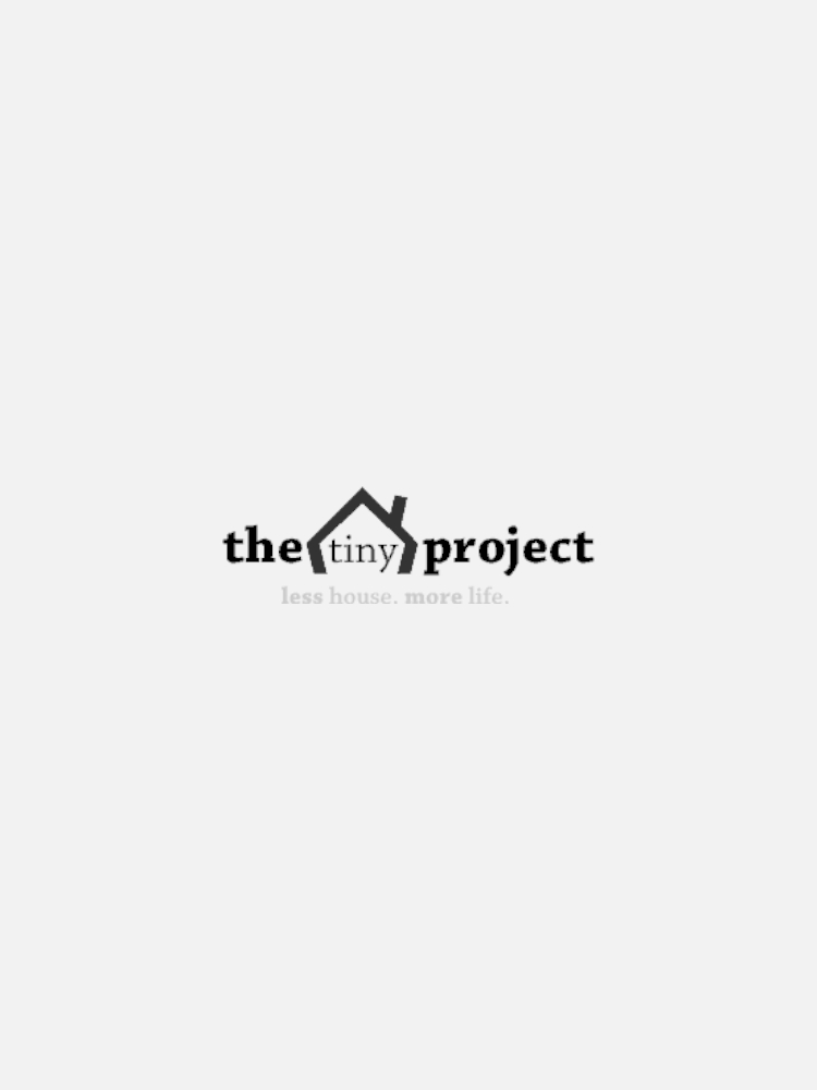 The Tiny Project logo features a house outline above the text 'the tiny project' with the tagline 'less house. more life.'.