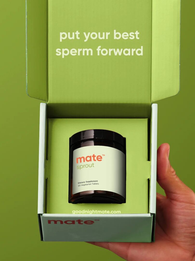 A hand holds an open green box containing a jar labeled "mate sprout." The box lid reads, "put your best sperm forward." Website "goodnightmate.com" is visible.