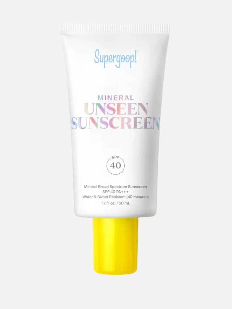 A tube of Supergoop! Mineral Unseen Sunscreen SPF 40 with a white body, iridescent text, and a yellow cap, containing 1.7 fl oz (50 ml).