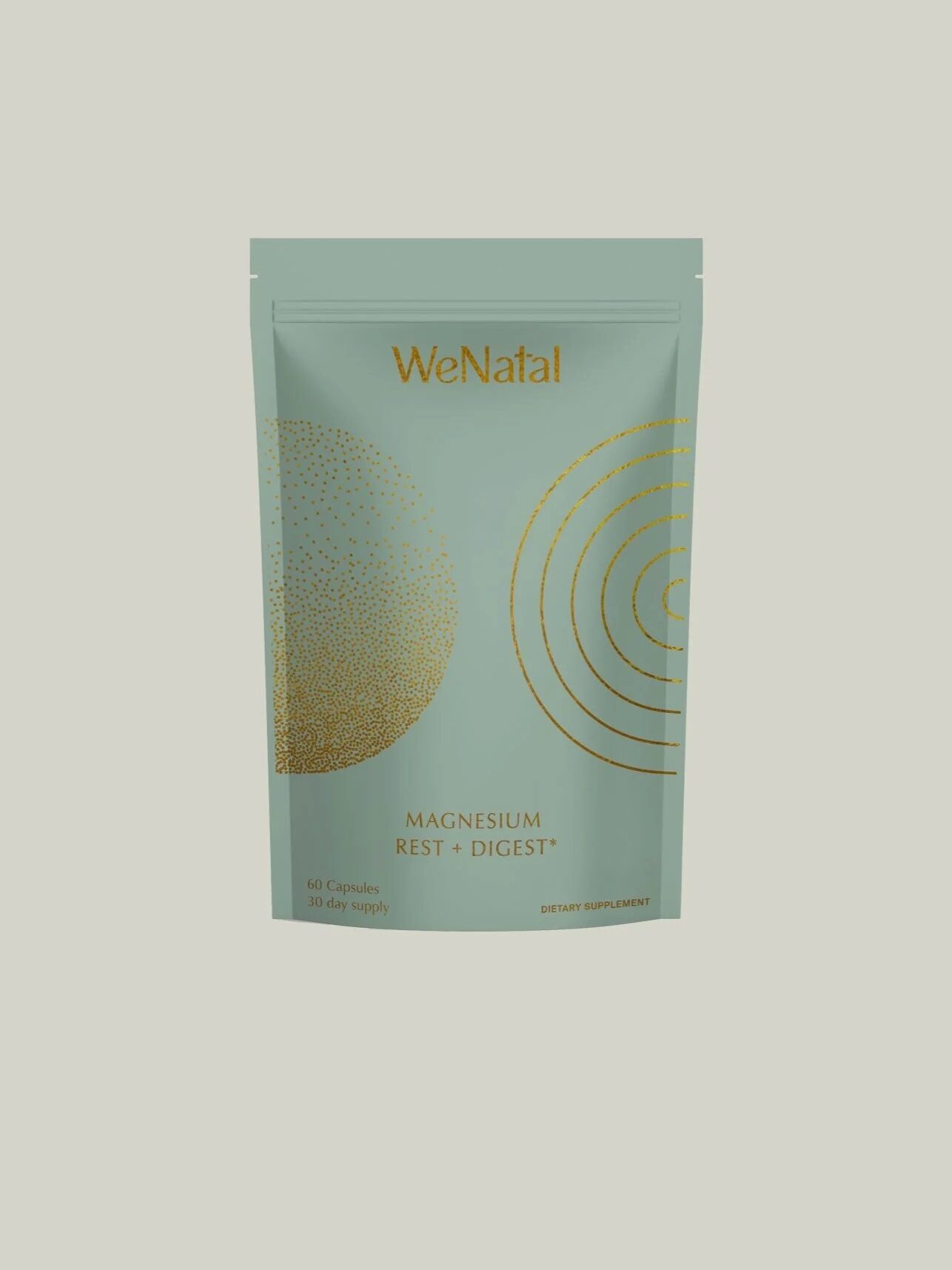 A teal Wenatal pouch labeled "Magnesium Rest + Digest" with gold accents, containing 60 capsules of dietary supplement.