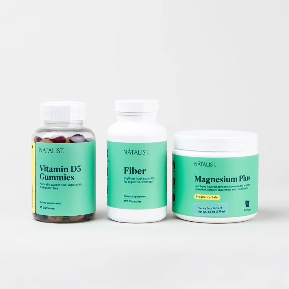 Three Natalist supplement containers labeled Vitamin D3 Gummies, Fiber, and Magnesium Plus are arranged side by side against a plain light background.