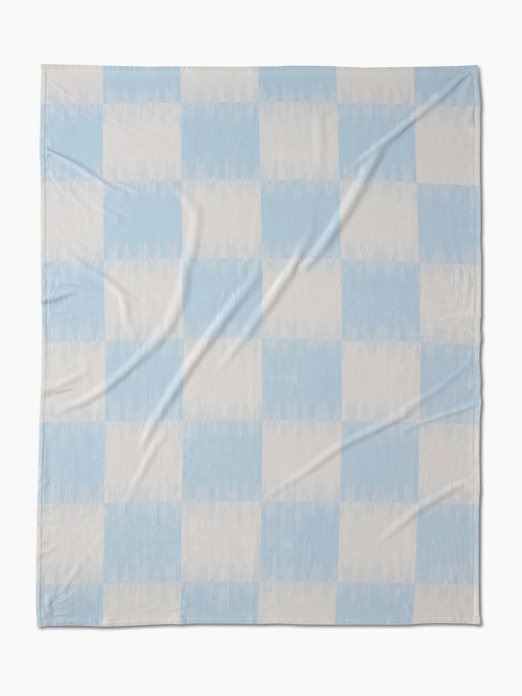 A square blanket featuring a light blue and white checkerboard pattern, displayed flat with some visible wrinkles.