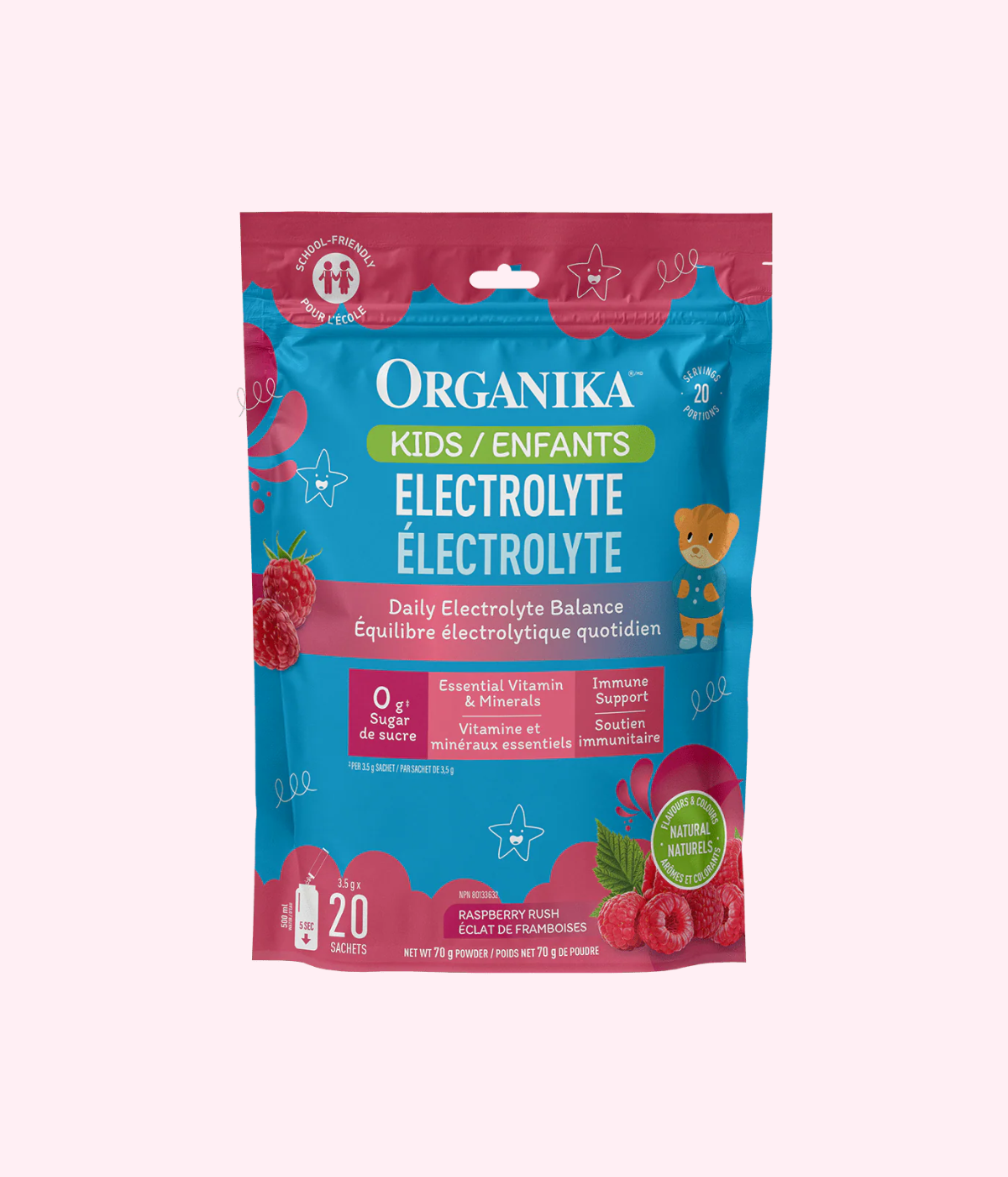 A blue and pink bag of Organika Kids Electrolyte powder, raspberry flavor, with raspberry images and a bear illustration, labeled for daily electrolyte balance and immune support.